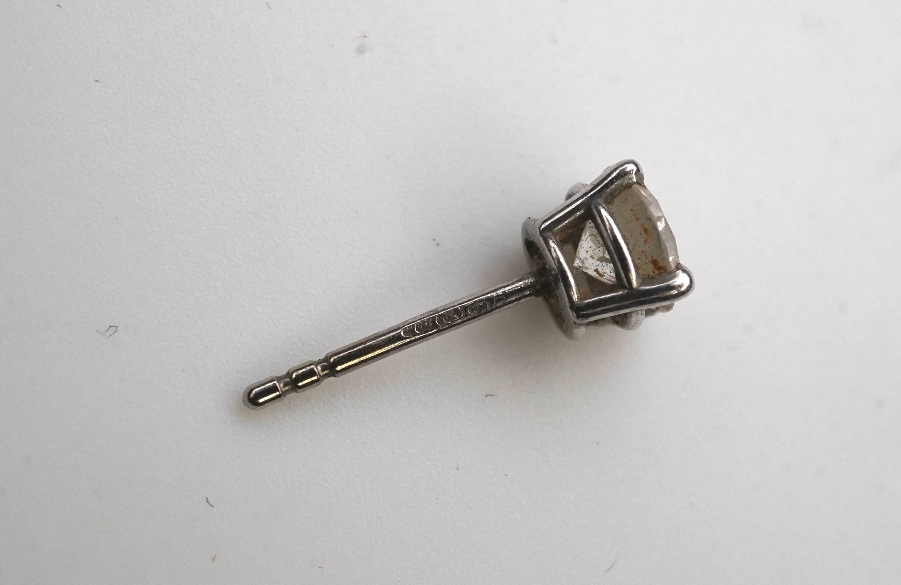 A diamond stud earring